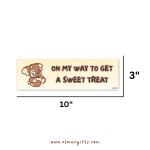 On My Way to Get a Sweet Treat bumper sticker measuring 10 inches wide by 3 inches tall by Elaine Girls