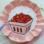 Strawberry Basket vinyl sticker featuring a pink market basket filled with fresh red strawberries by Elaine Girls