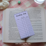 Purple reading log bookmark with spaces to track book titles, start and end dates, and star ratings by Elaine Girls