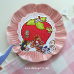Strawberry House Party vinyl sticker featuring Elaine Girls characters gathered around a giant strawberry house by Elaine Girls