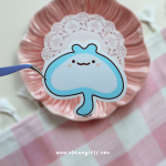 Manta Ray vinyl sticker featuring a cute smiling blue and white manta ray character by Elaine Girls